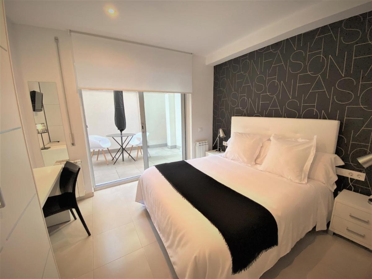 Hostal Somnis Suria Esterno foto